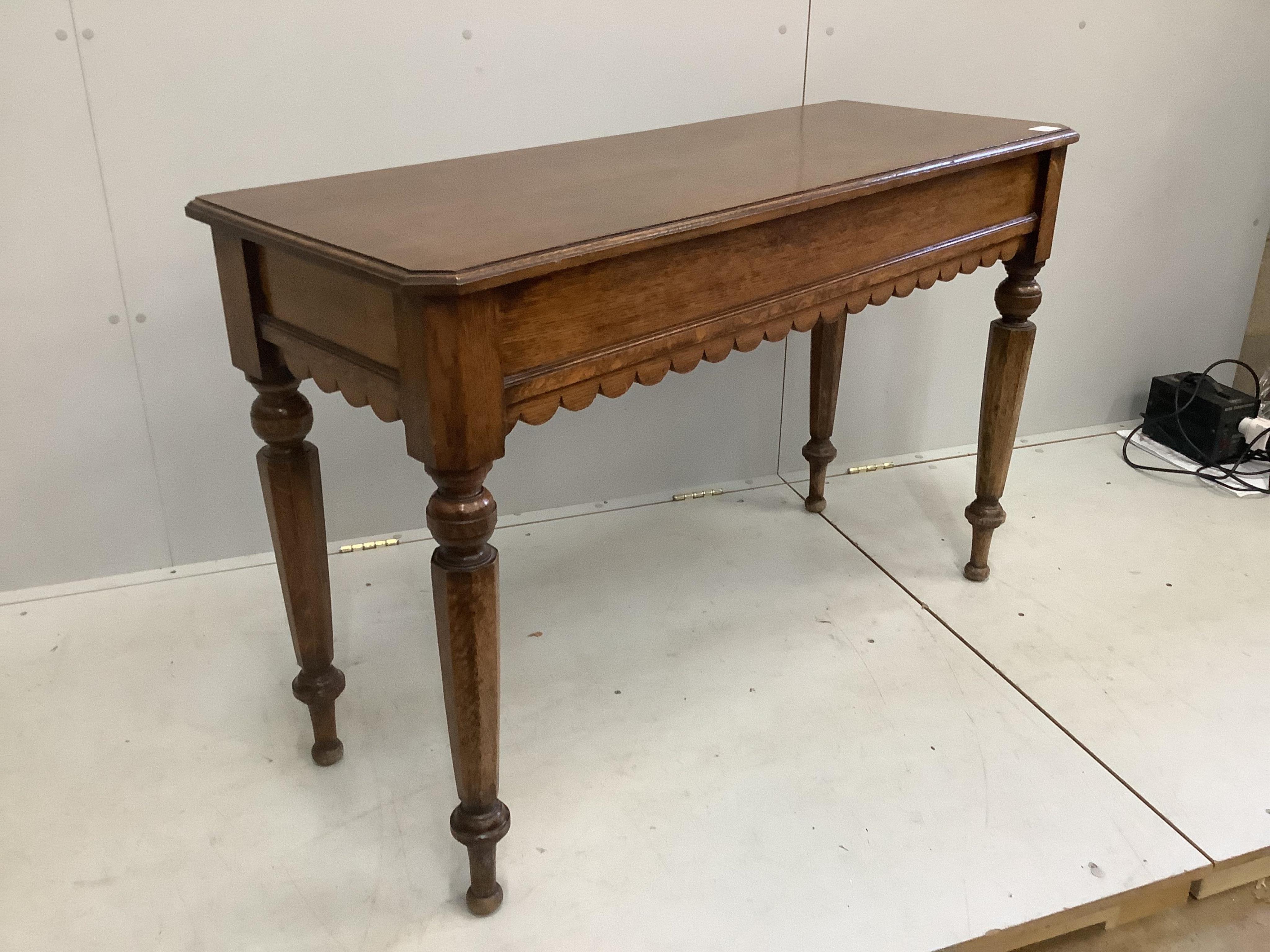 A Victorian oak side table, width 121cm, depth 45cm, height 78cm. Condition - fair